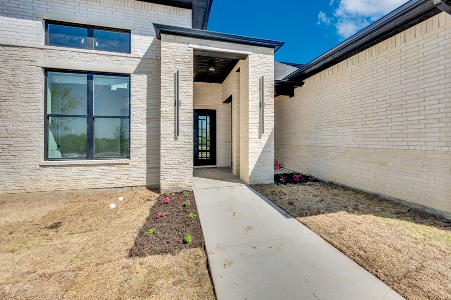 Front entry with tall windows